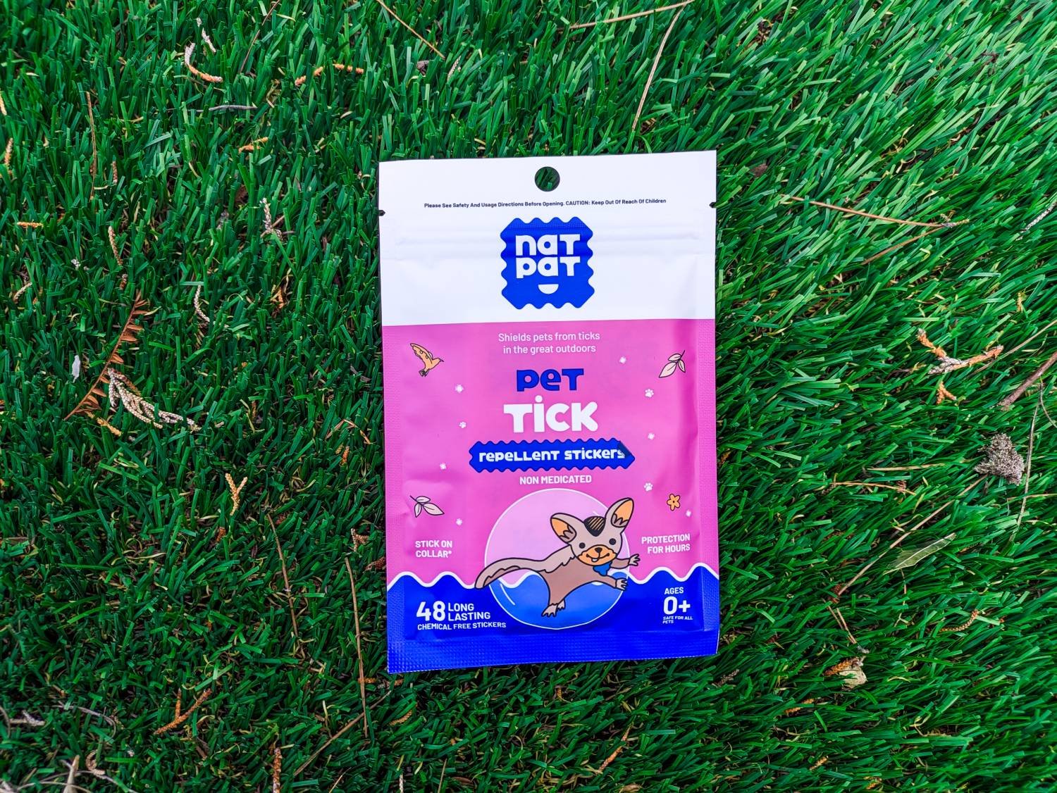 NATPAT Review - Pet Tick Repellent Stickers on grass